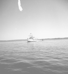 Calypso coming into Woods Hole harbor