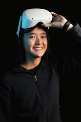 MIT-WHOI Joint Program student Amy Phung wearing virtual reality (VR) headset.