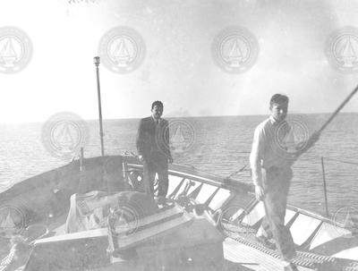 Unidentified men on the deck of Mentor