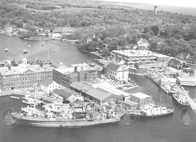 Aerial view of WHOI village facilities with R/V Chain and R/V Crawford at dock.