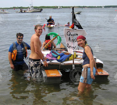 The crew launching the Queen Anne's Revenge