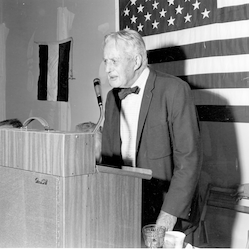 Dr. Alfred Redfield giving speech