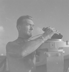 Edward Pierce with binoculars
