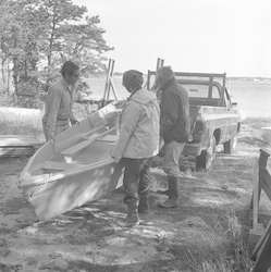 Howard Sanders and others examining oil spill.