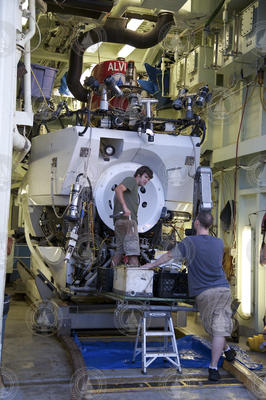 Dave Walter and Jeff McDonald prepping Alvin in its hangar.