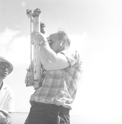 Robert Munns with an instrument on Atlantis II workboat