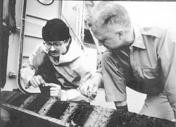 F. Beecher Wooding and John Hunt (r) viewing samples