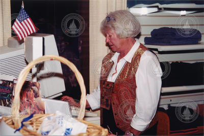 Ann Dunnigan working at the Exhibit Center gift shop.