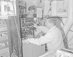 Alvin Bradshaw (left) and Karl Schleicher working in the lab on R/V Bear.