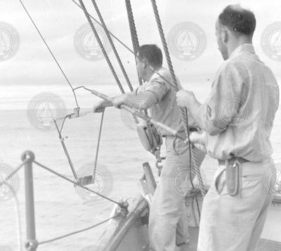 Dean Bumpus and Nat Corwin putting gear in water on Atlantis.