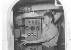Cyril Backus in the engine room aboard Crawford