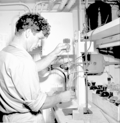 Eugene Krance working in lab aboard Albatross III