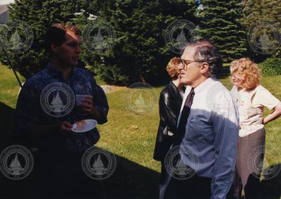 Craig Lewis (left) talking withCraig Van de Water at the 1998 Graduate Reception.