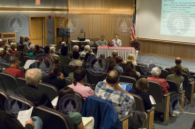 Kite-Powell, Doney, and Buesseler speaking from panel at colloquium.