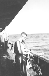 C. Godfrey "Gus" Day at the rail of Albatross III