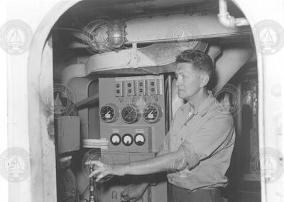Cyril Backus in the engine room aboard Crawford