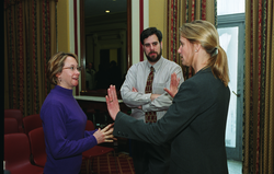 Ruth Curry (right) speaking with attendees of the briefing