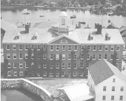 Aerial view of Bigelow Building, rear view, with Eel Pond in background.