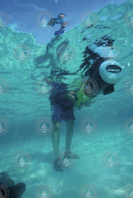 Andrey Scherbina deploying a REMUS 100 during research in Belize.