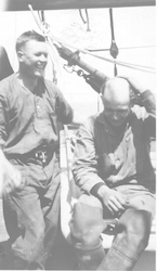 David M. Owen (right) and unidentified crewman