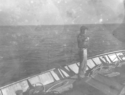 Unidentified man on deck of Mentor