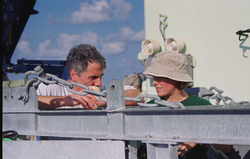 Dan Fornari and Jenny Engles talking on deck.