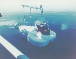 Sea Cliff suspended above the water, poor color photo