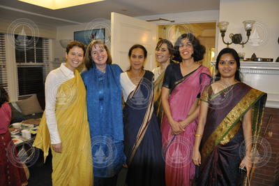 A group of women wearing saris for Diwali Night.