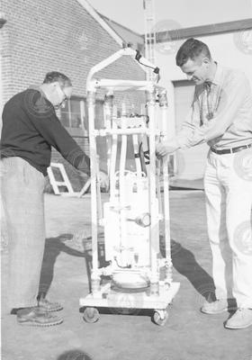 Willard Dow and Stephen Stillman with echo sounder used during Thresher search.
