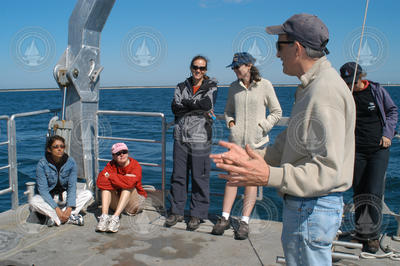 John Trowbridge speaks with the 2004 Ocean Science Journalism Fellows aboard Tioga.