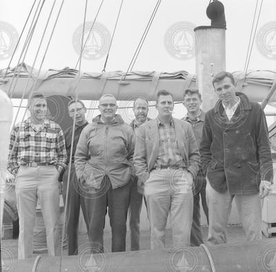 Group at dock with Atlantis.