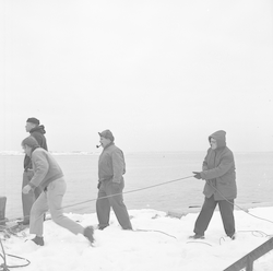 Dick Backus (left), Dick Edwards, Milt Rutstien (center) and unidentified man.