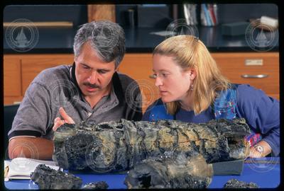 Dan Fornari and Trish Gregg inspect a portion of a lava pillar.