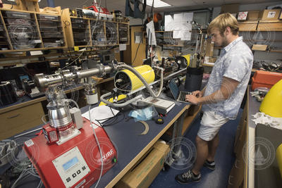 Zachary Duguid working on a Slocum glider in the lab.