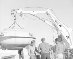 Jacques Cousteau and others working with Cousteau saucer