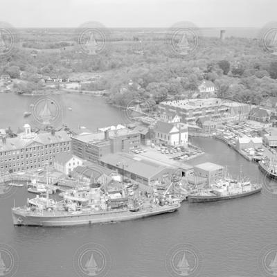 Aerial view of WHOI pier in 1965 with Chain, Bear and Crawford.