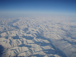 Aerial view of the Arctic Circle rugged terrain.