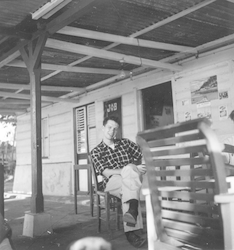 Arthur D. Colburn Jr., sitting on a porch.