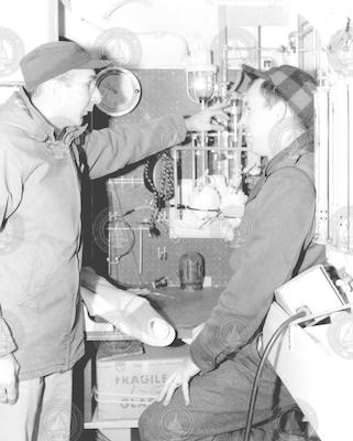 Vaughan Bowen (left) and John Schilling below deck of Crawford