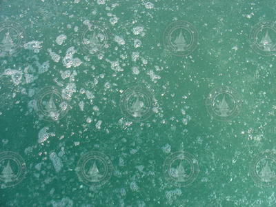Bubbles of gas (mainly methane) erupt at the sea surface of the oil seeps.