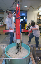 Jeff Sherman and Brian Guest working with Spray Glider in lab.