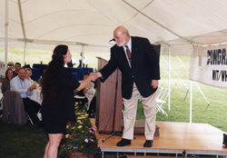 Shannon Bard shaking hands with John Farringto.