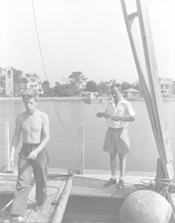 Gerrit Duys and Hilary Moore aboard Euphausia Raft in Eel Pond