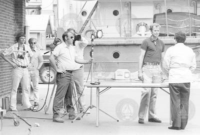 John Milliman (2nd from right) and others on WHOI dock.