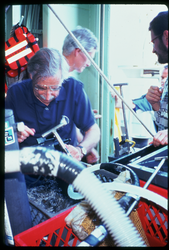 Holger Jannasch looking at the samples retrieved from Alvin.