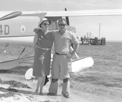 Robert Weeks and unidentified person on beach