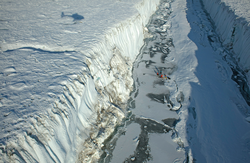Fiamma Straneo and colleagues workingin a glacial crevass.