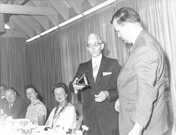 Paul Fye presenting Bruce Heezen with the Bigelow Medal.