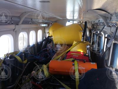 Twin Otter Planes packed with ice buoys and other equipment.