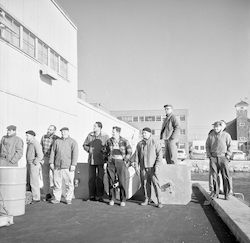 Group of people near dock.
